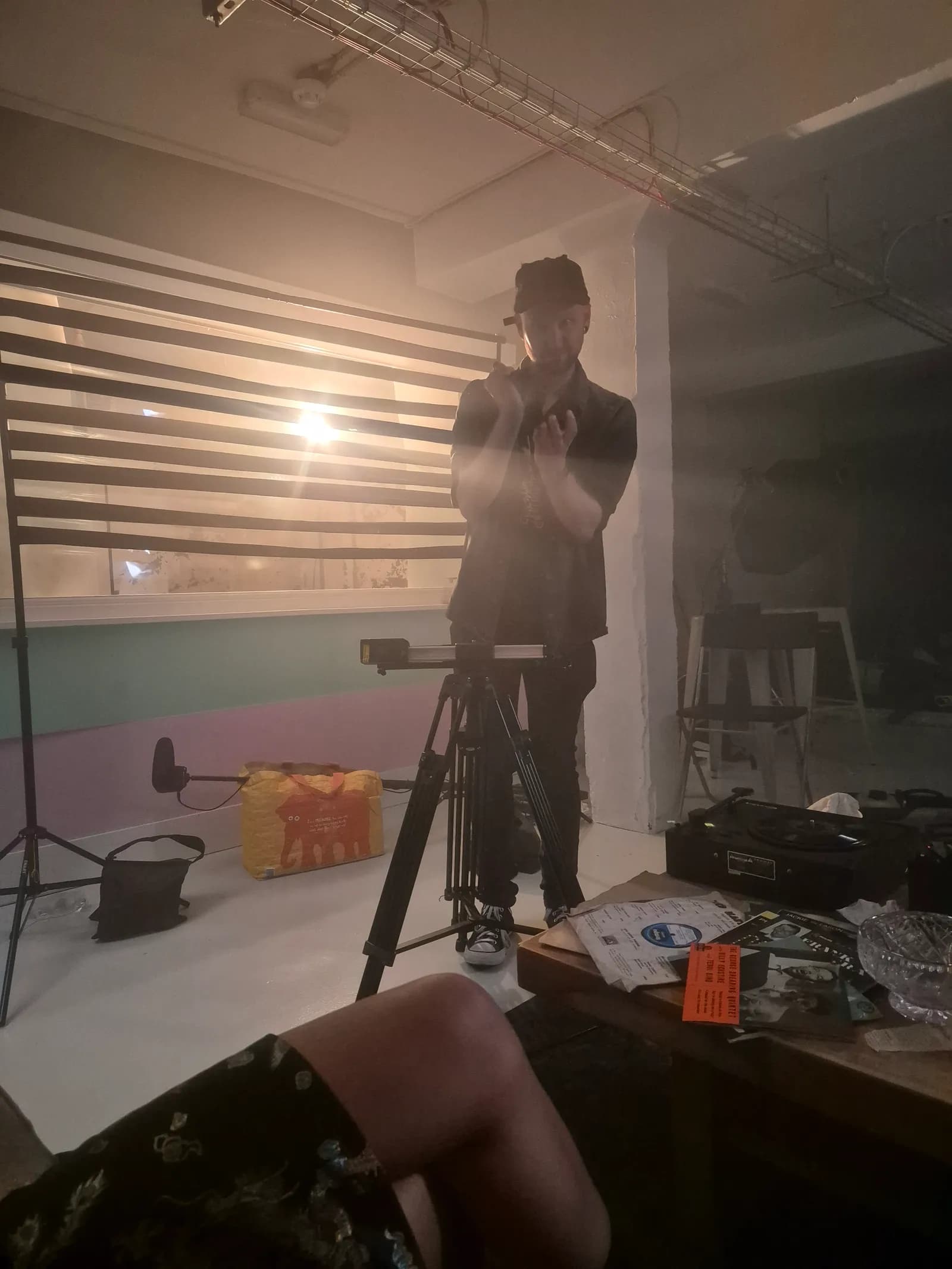 Cinematographer Jay Sillence creating practical light and shadow effects on set